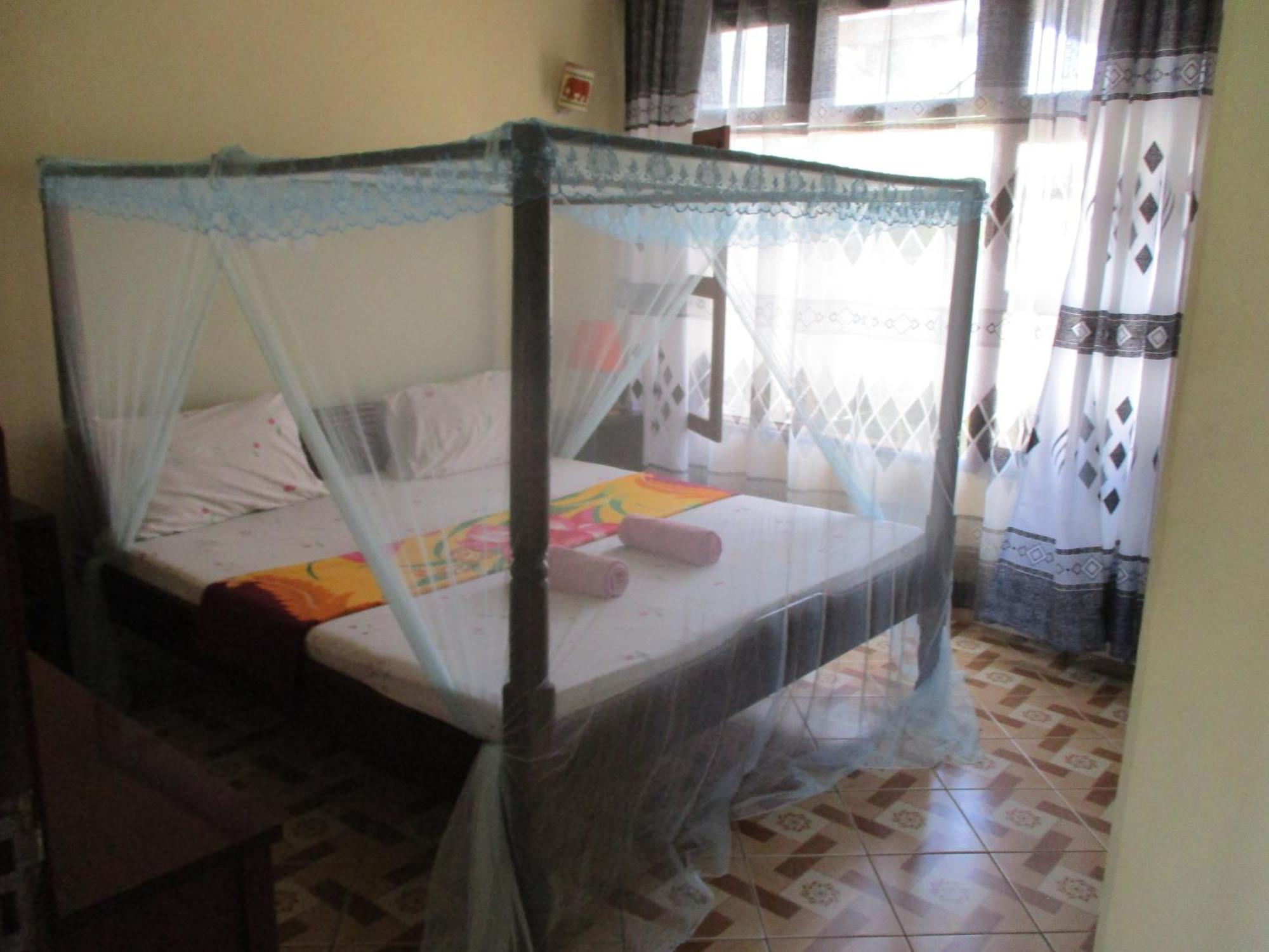Simba Apartments Diani Beach Szoba fotó